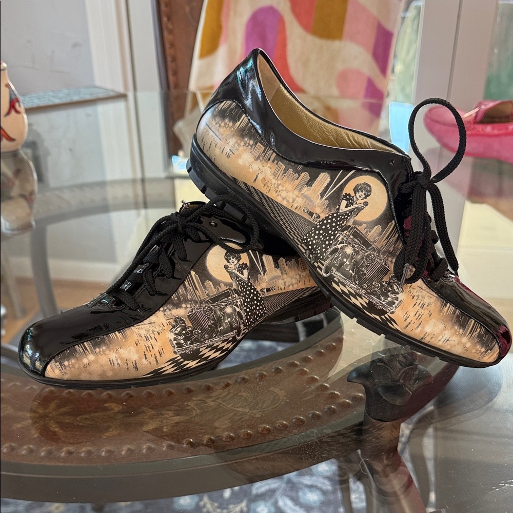 Icon wearable art, black, and brown leather shoe. Size 6
